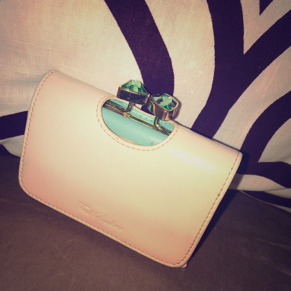 Ted baker wallet moderately used. Crystal closure